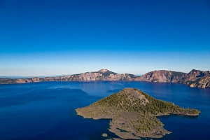 Wizard Island and the still waters of Crater Lake, the deepest lake in the U. S. A