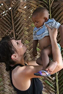 Baby Prints: Woman with an African child, Lome, Togo, West Africa, Africa