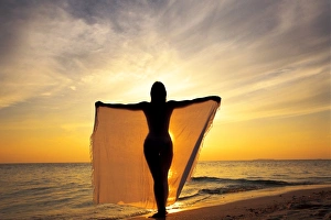 Images Dated 16th October 2008: Woman on a beach at sunset, Maldives, Indian Ocean, Asia
