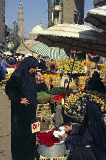 Cheese Prints: Woman buying cheese in market near the Citadel, Cairo, Egypt, North Africa, Africa