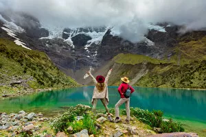 Search Results: Two woman enjoying the view of crystal clear Humantay Lake, Cusco, Peru, South America
