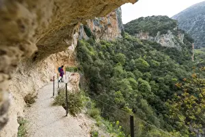 Weekend Activities Prints: A woman hiking in the Taygetos Mountains above Mystras in the Peloponnese, Greece, Europe