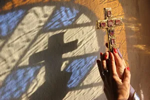 Crosses Prints: Woman holding a cross, Servoz, Haute-Savoie, France, Europe