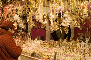 Images Dated 22nd December 2007: Woman looking at Christmas decorations at stall, Christkindlmarkt (Christmas Market)