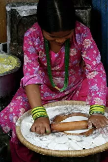 Images Dated 21st July 2007: Woman making chapati, Dakshin Kali, Nepal, Asia