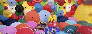 Posturing Prints: Woman painting umbrellas