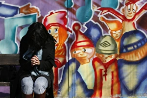 Obscured Face Prints: Woman praying on a bench, Chambery, Savoie, France, Europe