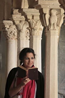 Images Dated 26th April 2010: Woman reading the Bible in the Cloister of Saint Sauveur, Aix en Provence