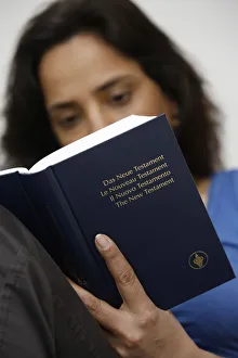 Images Dated 18th March 2009: Woman reading a Bible, Jordan, Middle East