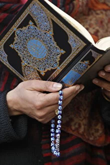 Images Dated 19th March 2009: Woman reading Koran, Jordan, Middle East