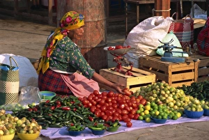 Stalls Prints: Woman selling vegetables from stall in Tlacolula Market, Oaxaca Region