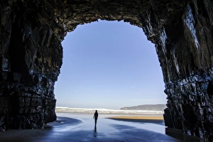 Catlins Prints: Woman standing in the giant Cathedral caves