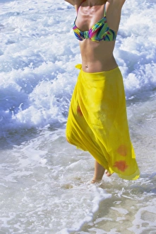 Bare Foot Prints: Woman standing in the surf