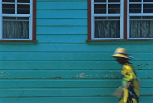 Woman walking in Anse La Raye, St