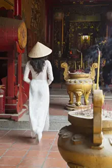 One Woman Prints: Woman wearing ao dai dress at Ha Chuong Hoi Quan Pagoda, Cholon, Ho Chi Minh City