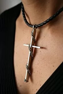 Images Dated 18th August 2006: Woman wearing a cross, Paris, France, Europe