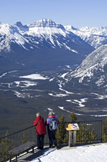 Images Dated 22nd February 2008: Two women and the Bow Valley from the top of Sulphur Mountain, Banff National Park