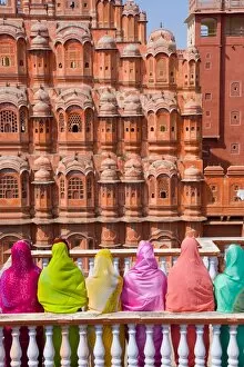 Images Dated 20th October 2006: Women in bright saris in front of the Hawa Mahal (Palace of the Winds), built in 1799, Jaipur