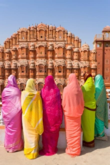 Images Dated 20th October 2006: Women in bright saris in front of the Hawa Mahal (Palace of the Winds), built in 1799, Jaipur