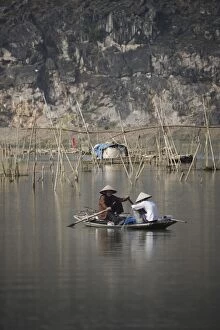 Women fishing in river from boat, Vietnam, Indochina, Southeast Asia, Asia