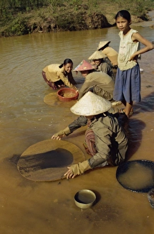 Squatting Prints: Women panning for black tin oxide