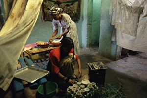 Ethiopia Prints: Women preparing food and drink for coffee ceremony, Abi Adi village, Tigre region