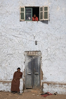 West Bank Prints: Women relax at their home on the west bank of Luxor, Egypt, North Africa, Africa