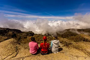 35 39 Years Gallery: Women taking in the view on their way up Mount Kilimanjaro, UNESCO World Heritage Site, Tanzania