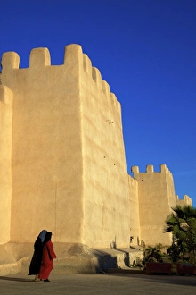 City Wall Prints: Women in traditional dress with Old City wall, Taroudant, Morocco, North Africa, Africa