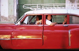 Pleasure Prints: Women waiting in taxi in the early morning, Havana, Cuba, West Indies, Central America