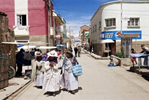 Copacabana Prints: Women walking down street, Copacabana, LakeTiticaca, Bolivia, South America