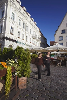 Images Dated 20th August 2009: Women walking into Town Hall Square (Raekoja Plats), Tallinn, Estonia, Baltic States
