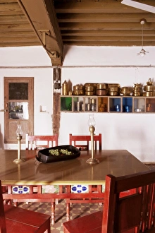 Ahmedabad Prints: Wood beamed ceiling and kitchen utensils on wall in