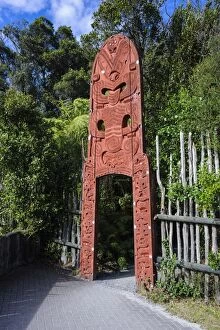 Images Dated 4th April 2011: Wooden carved entrance at the Te Puia Maori Cultural Center, Rotorura, North Island, New Zealand