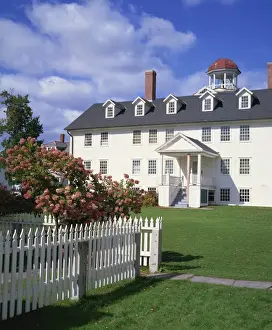 Wooden house and picket fence in the Shaker village of Canterbury
