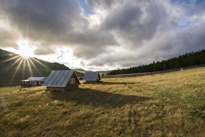 Mongolian Prints: Wooden houses at sunrise, Burentogtokh district, Hovsgol province, Mongolia, Central Asia