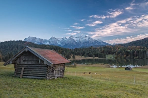 Barn Prints: Wooden hut frames the alpine lake surrounded by the Alps