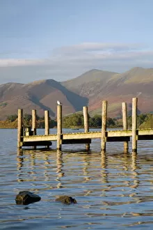 Jetties Collection: Wooden jetty at Barrow Bay landing on Derwent Water looking north to Skiddaw in autumn