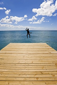 Jump Prints: Wooden jetty leading into the Caribbean Sea, Frigate Bay Beach, St. Kitts
