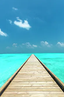 Wooden Jetty out to tropical Sea, The Maldives, Indian Ocean, Asia
