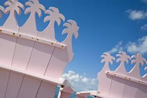 Images Dated 10th November 2007: Detail of wooden pink beach chairs with backs carved in the shape of palm trees