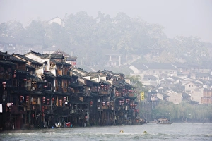 Images Dated 8th November 2008: Wooden stilt houses in riverside old town of Fenghuang, Hunan Province, China, Asia