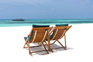 Wooden sun loungers on beach, Coco Palm, Dhuni Kolhu, Baa Atoll, Republic of Maldives