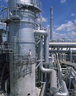 Pipe Prints: A worker wearing hard hat and using a mobile phone