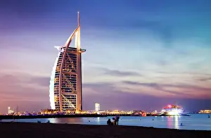 Jumeirah Prints: The world's first seven stars luxury hotel Burj Al Arab at night seen from Jumeirah public beach in Dubai
