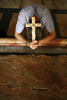 Images Dated 18th September 2007: Worshipper at the Stone of the Anointing, Church of the Holy Sepulchre