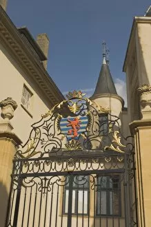 Wrought iron gate with coat of arms