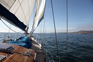 Nautical Vessel Prints: Yacht sailing west along the coast, Dorset, England, United Kingdom, Europe