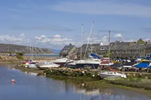 Yachts moored on River Soch estuary waiting for the incoming tide on the Warren