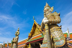Thai Culture Prints: Yaksha Thotsakhirithon statue in front of Phra Ubosot